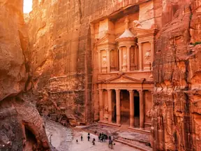 The Treasury carved into the rock at Petra